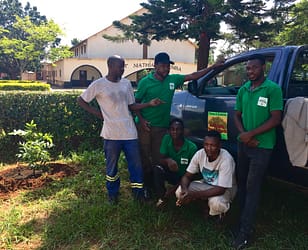 Trees for Zambia Team planting Trees at St Mathias Catholic Church Bauleini